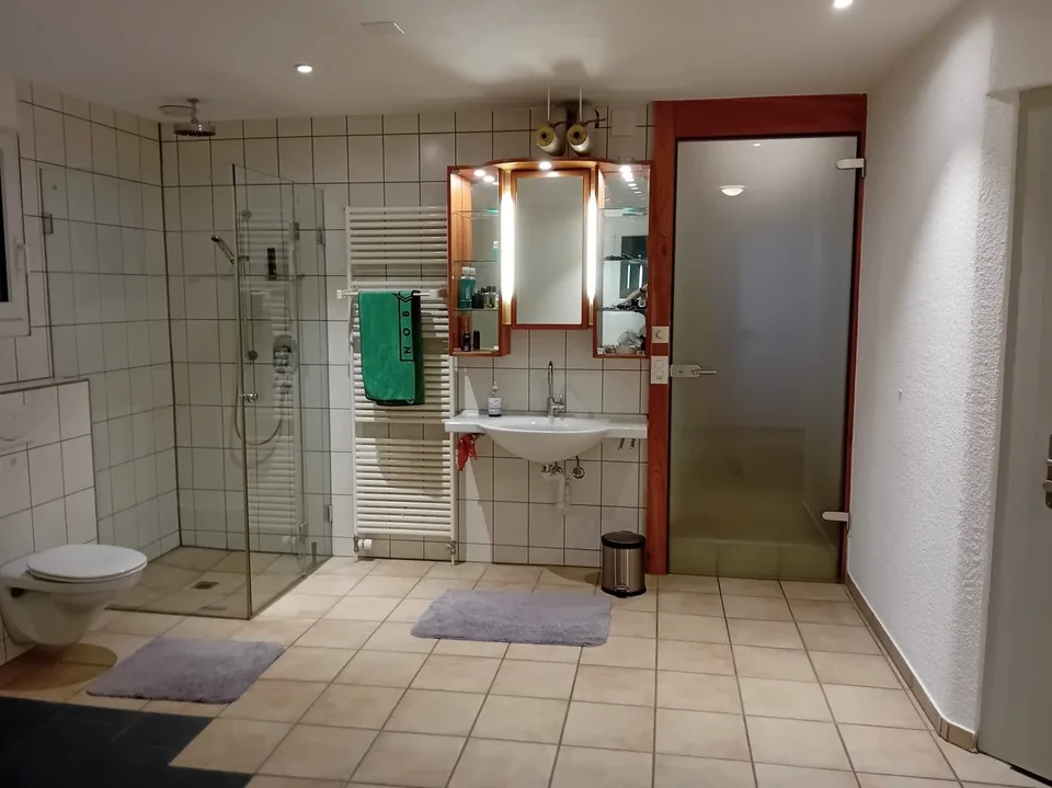 Casa familiare di 5,5 locali con camino e garage