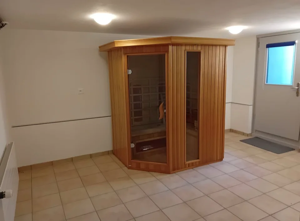 Casa familiare di 5,5 locali con camino e garage