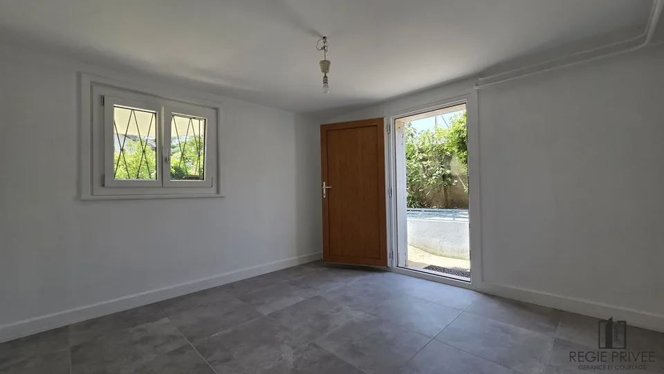 Appartement avec sous-sol privatif et immense jardin