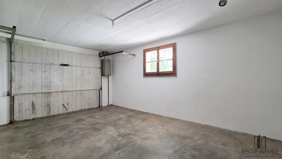 Appartement avec sous-sol privatif et immense jardin