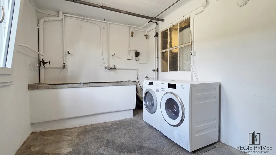 Appartement avec sous-sol privatif et immense jardin