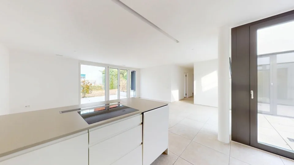 Garden apartment with row house character - stylish living in high-quality
