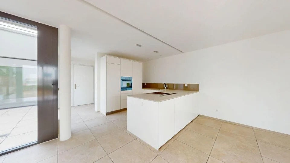 Garden apartment with row house character - stylish living in high-quality