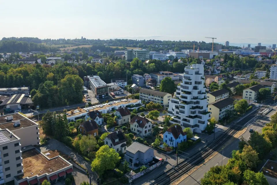Garden apartment with row house character - stylish living in high-quality