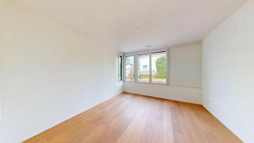 Garden apartment with row house character - stylish living in high-quality