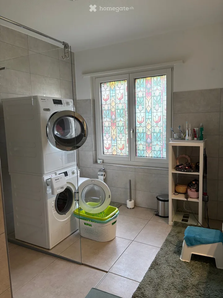 Dreamy 5.5-room apartment with its own garden