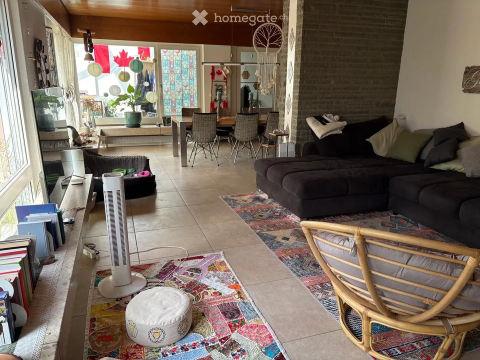 Traumhafte 5.5-Zimmer-Wohnung mit eigenem Garten