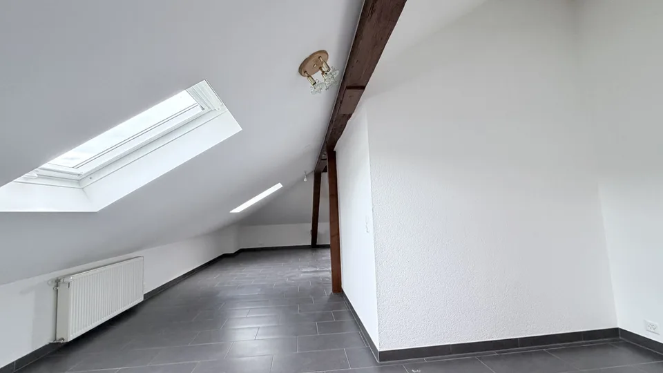 Beautiful 52 m² attic loft with exposed beams - Orbe