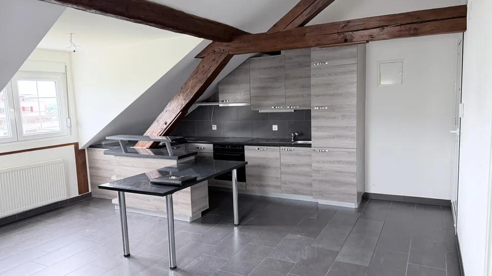 Beautiful 52 m² attic loft with exposed beams - Orbe