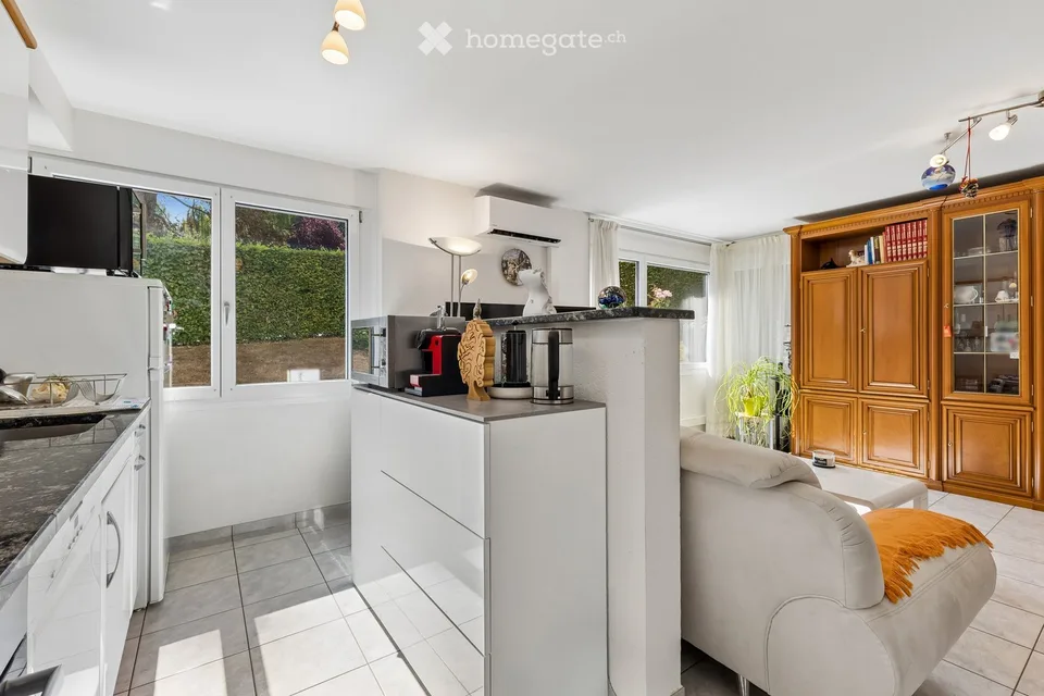 Appartement attractif et lumineux de 4,5 pièces avec espace de jardin à Binningen, dans un endroit calme et verdoyant