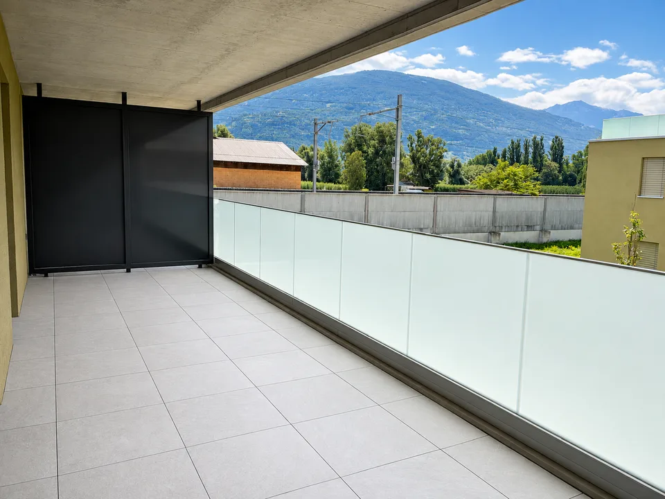 1er étage – Neuf – Places de parc intérieure – Grand balcon