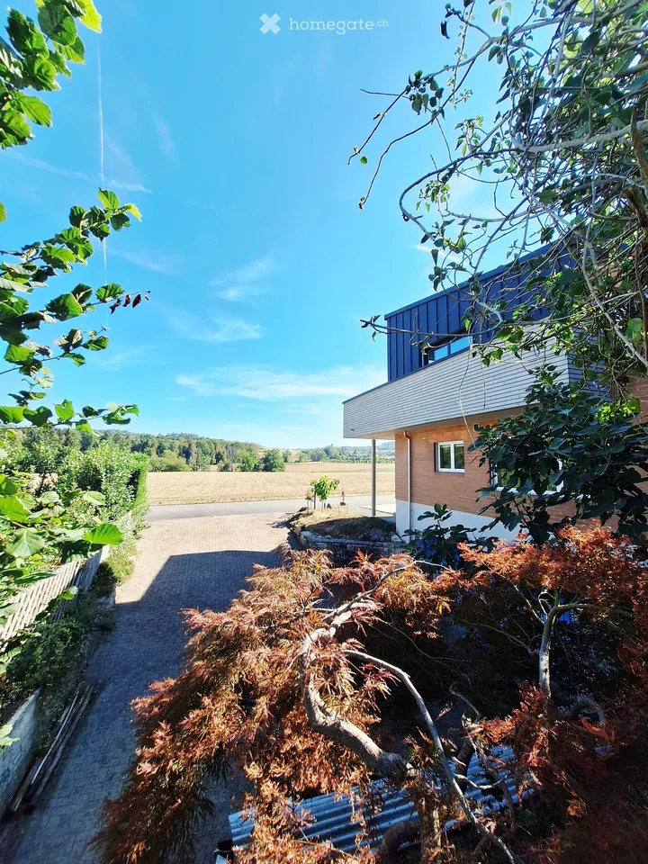 Hausteil mit Garten und Blick ins Grüne