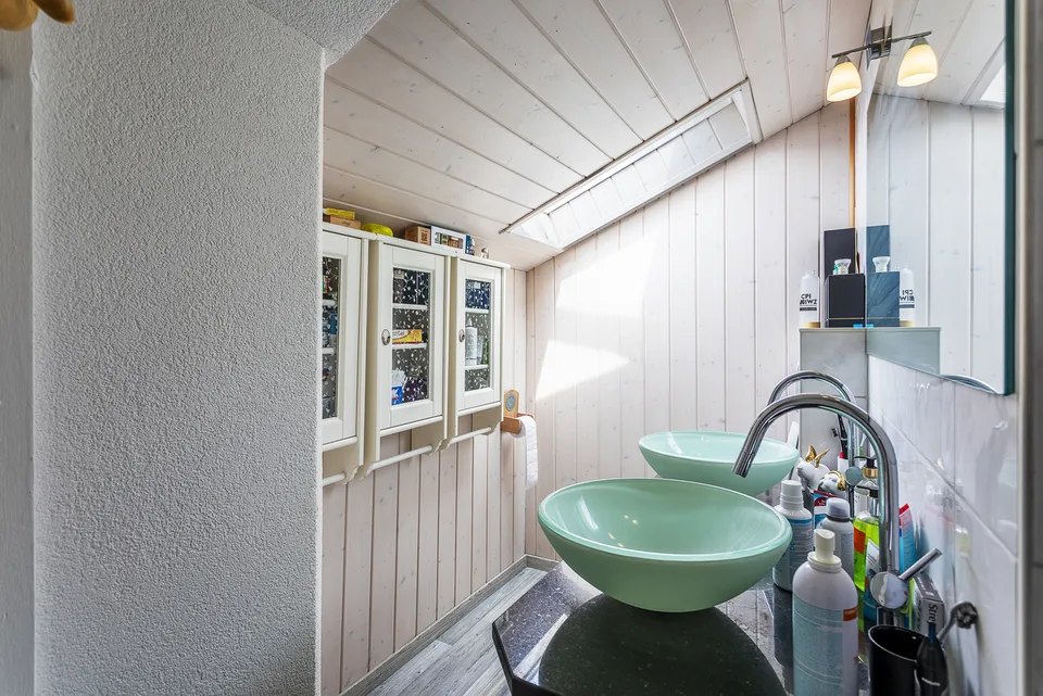 Einfamilienhaus mit Garage und Autoverdeck