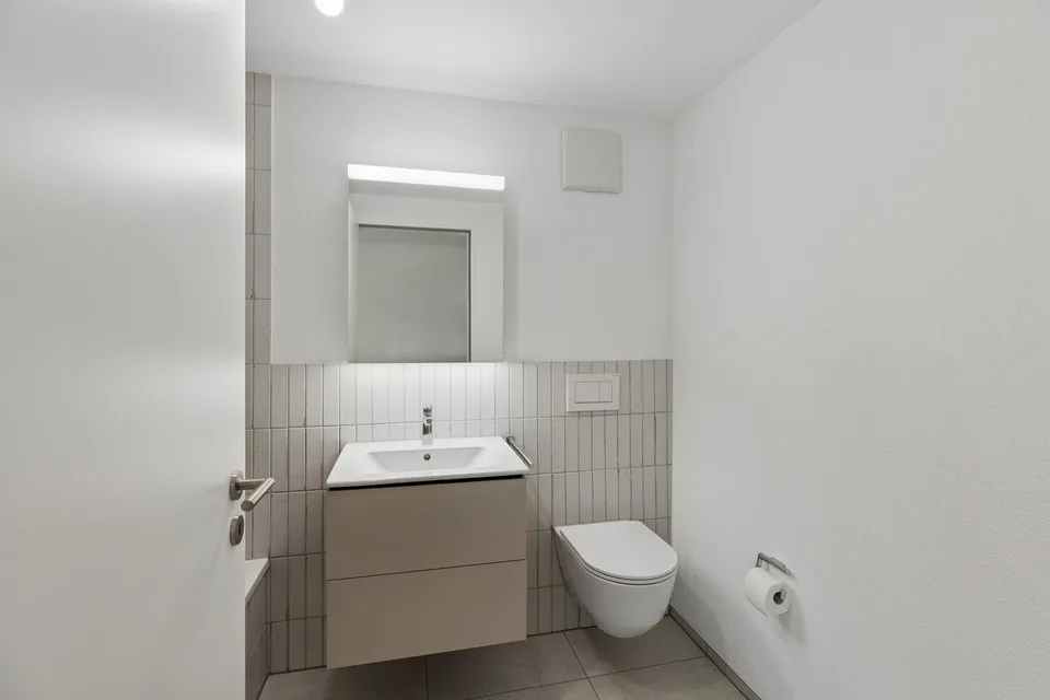 Edificio nuovo con vista panoramica - appartamento moderno di 3,5 locali in mansarda con molto comfort abitativo