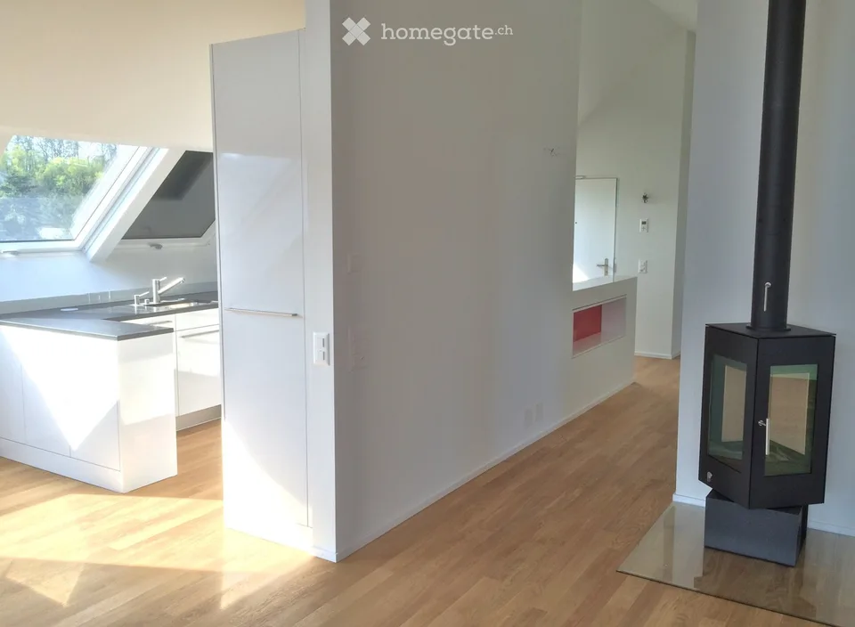 Avec l'ascenseur directement dans l'appartement mansardé
