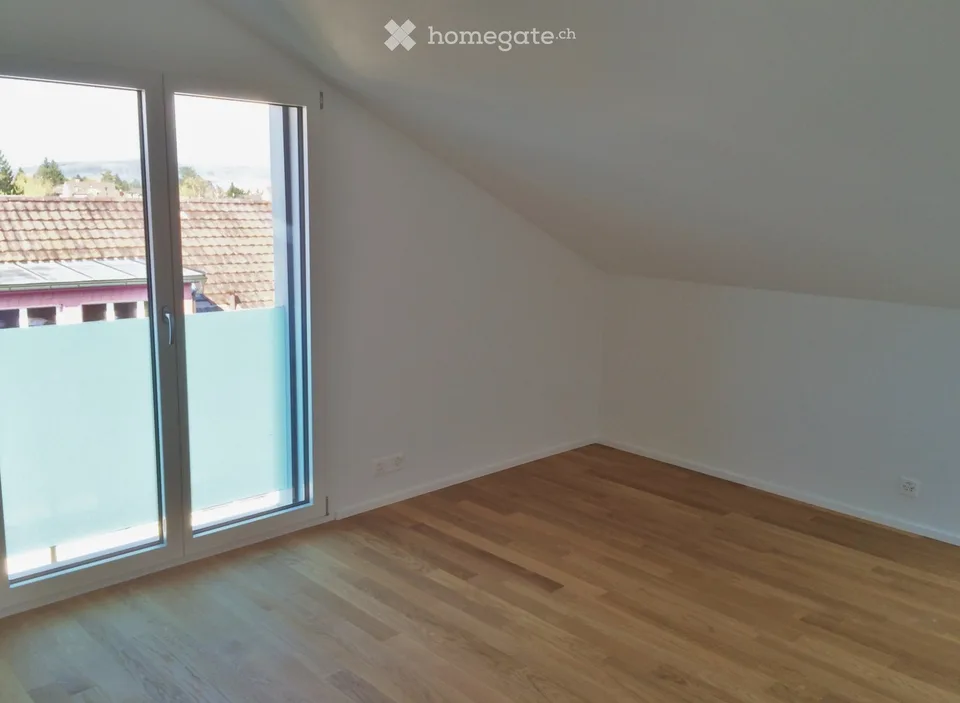 Avec l'ascenseur directement dans l'appartement mansardé