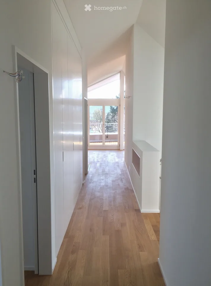 Avec l'ascenseur directement dans l'appartement mansardé