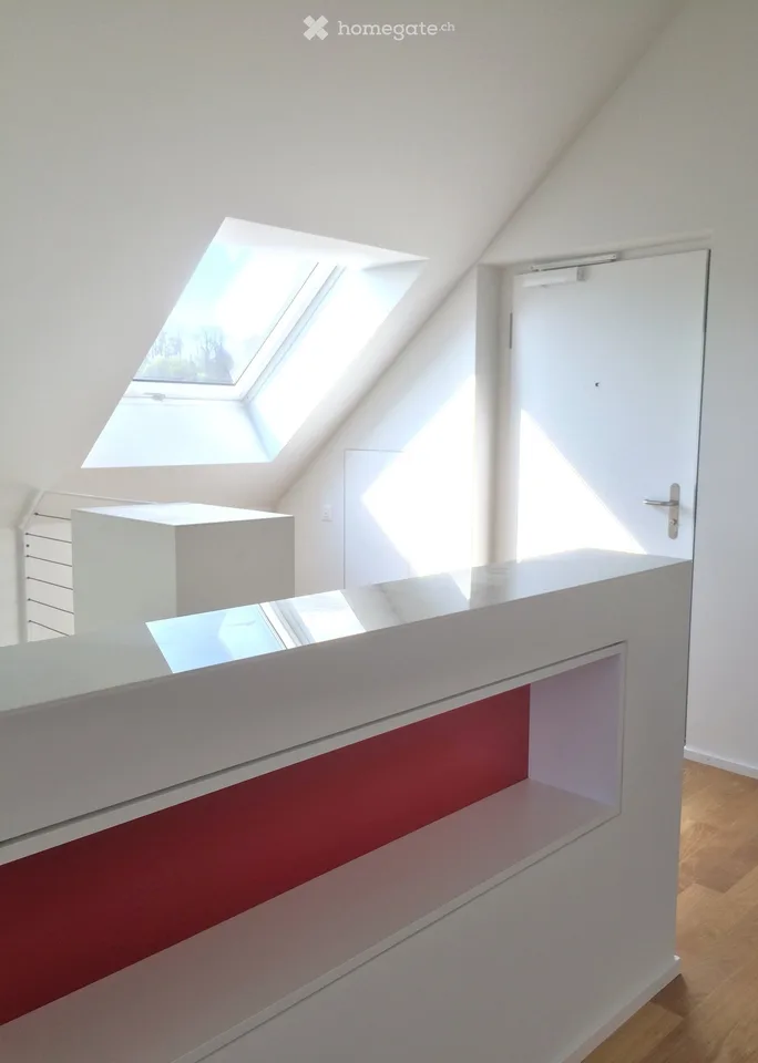 Avec l'ascenseur directement dans l'appartement mansardé