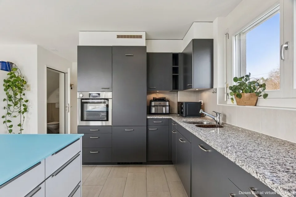 Charmante Maisonette-Dachwohnung in Bassersdorf mit Sonnenbalkon