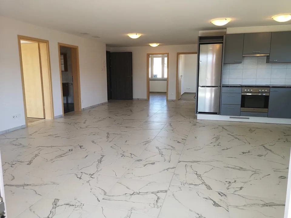 Appartement neuf au 1er étage avec terrasse couverte, avec vue.