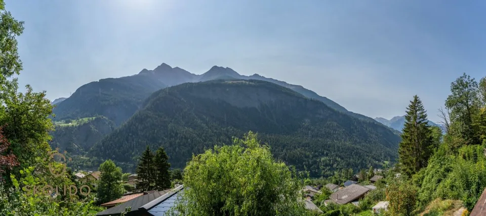Idyllic chalet in the heart of the Swiss Alps with surrounding grounds