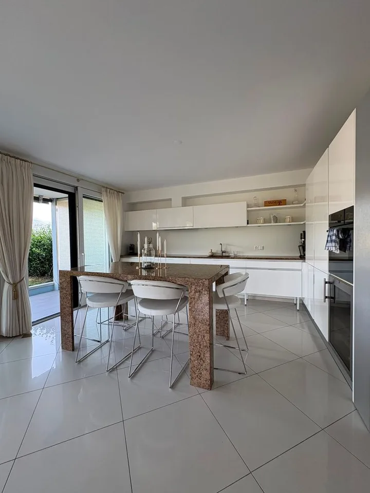 Appartamento di 4.5 locali con giardino, Agno