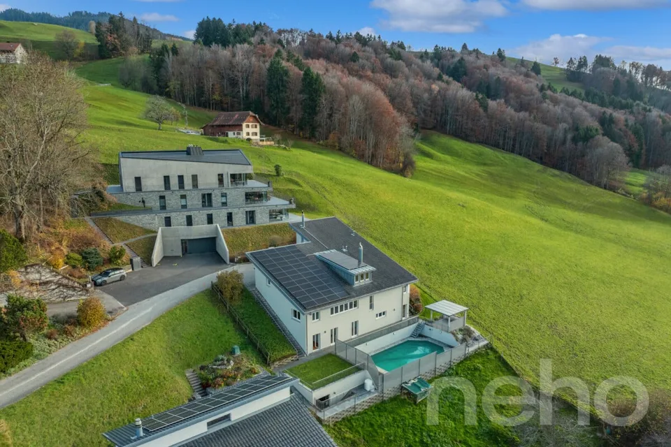 Lusso discreto a La Roche: Villa d'eccezione con vista panoramica