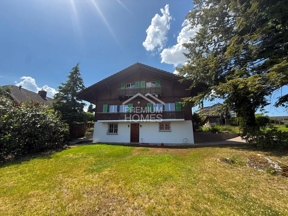 Chalet di charme con un'idillio di giardino da sogno