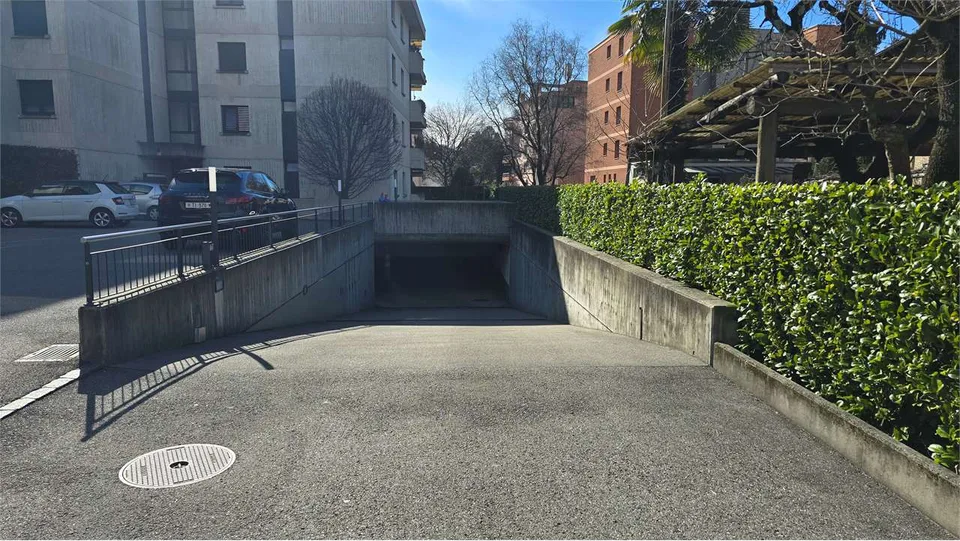 Caslano Via Stazione - 2 Parking Spaces in Garage