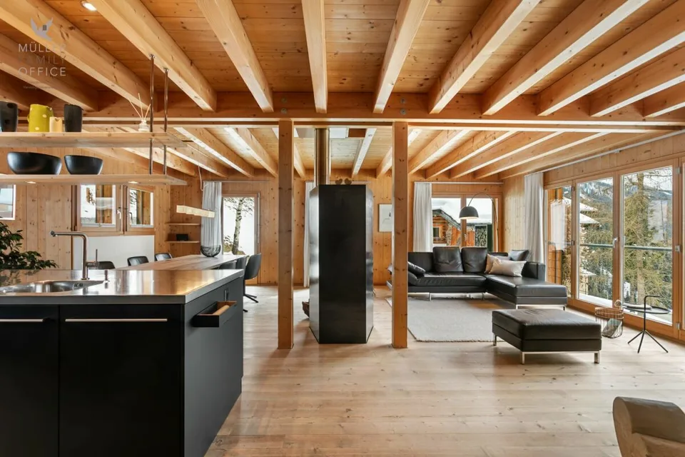 Stylish wooden house with alpine charm and sustainable living and energy concept