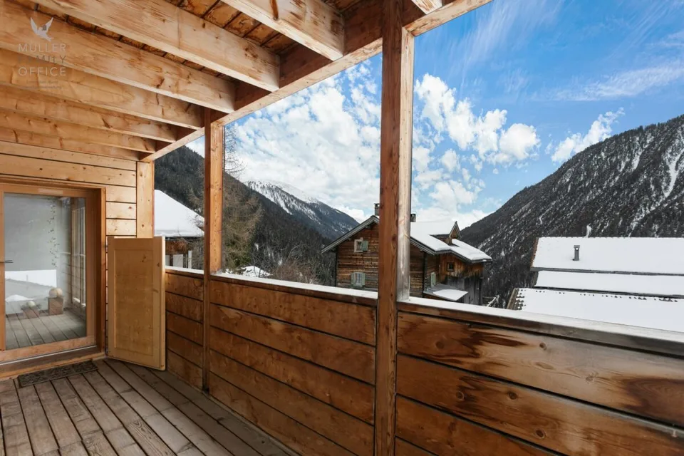 Stylish wooden house with alpine charm and sustainable living and energy concept