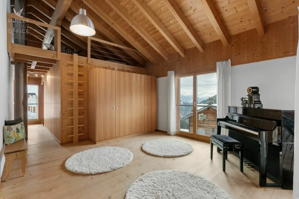 Stylish wooden house with alpine charm and sustainable living and energy concept