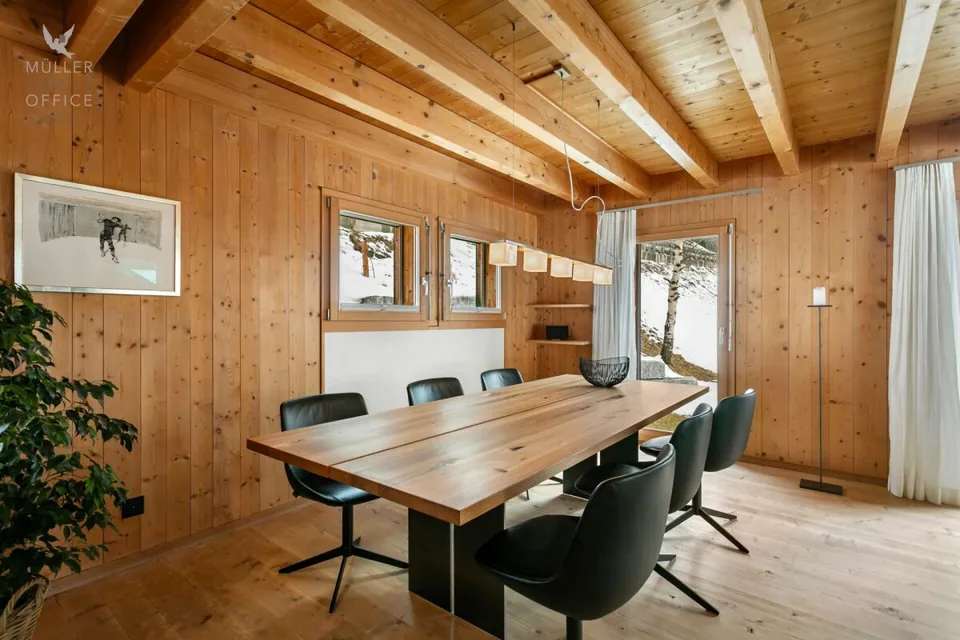 Stylish wooden house with alpine charm and sustainable living and energy concept