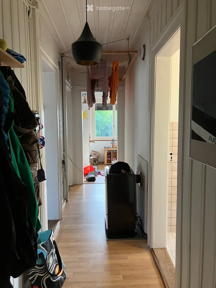 Charmant appartement 4 pièces en chalet de bois avec part de jardin
