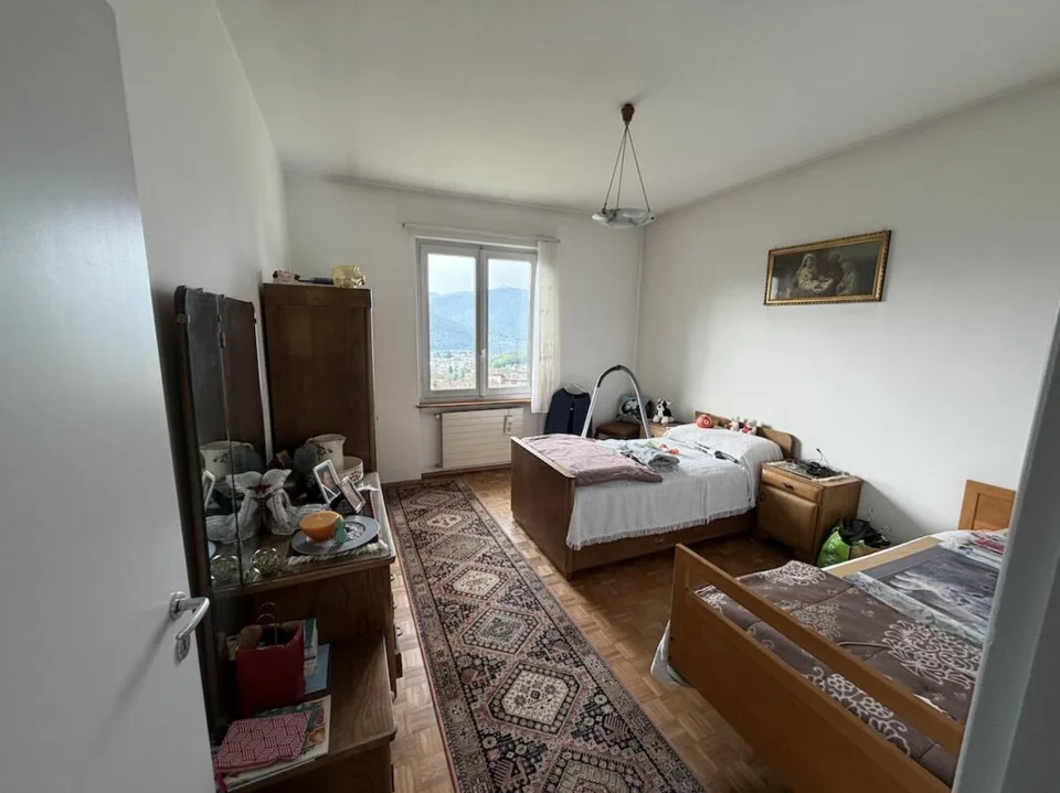 Haus mit Einliegerwohnung und Seesicht Casa con appartamento indipendente e vista lago.