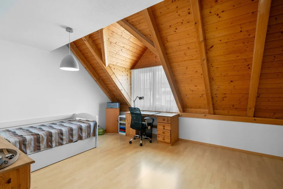 Maison mitoyenne familiale avec beau jardin à Lufingen