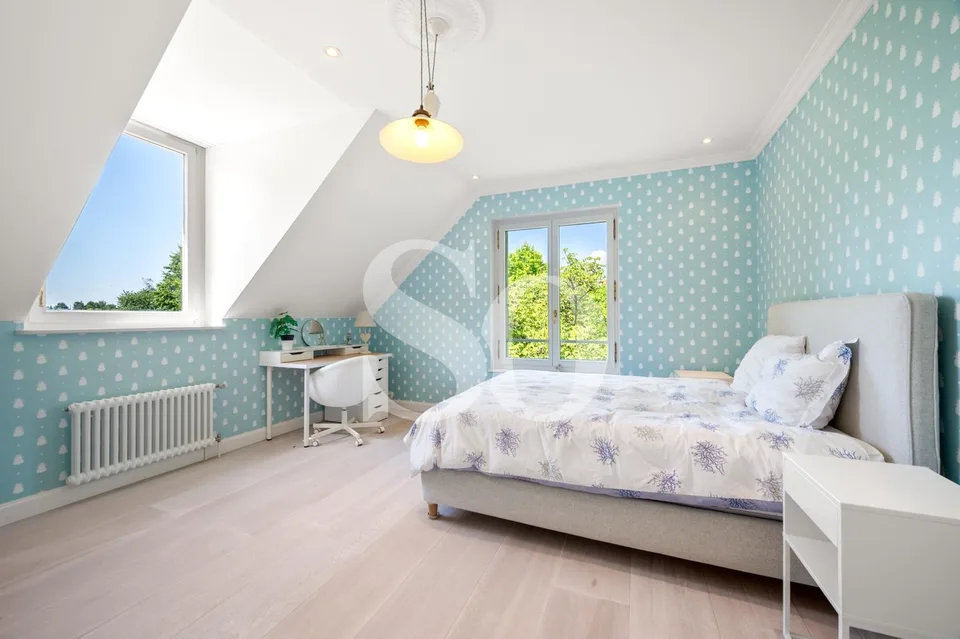Exclusivité: Élégante villa familiale sur une vaste parcelle à quelques pas du lac – photo 22 sur 25