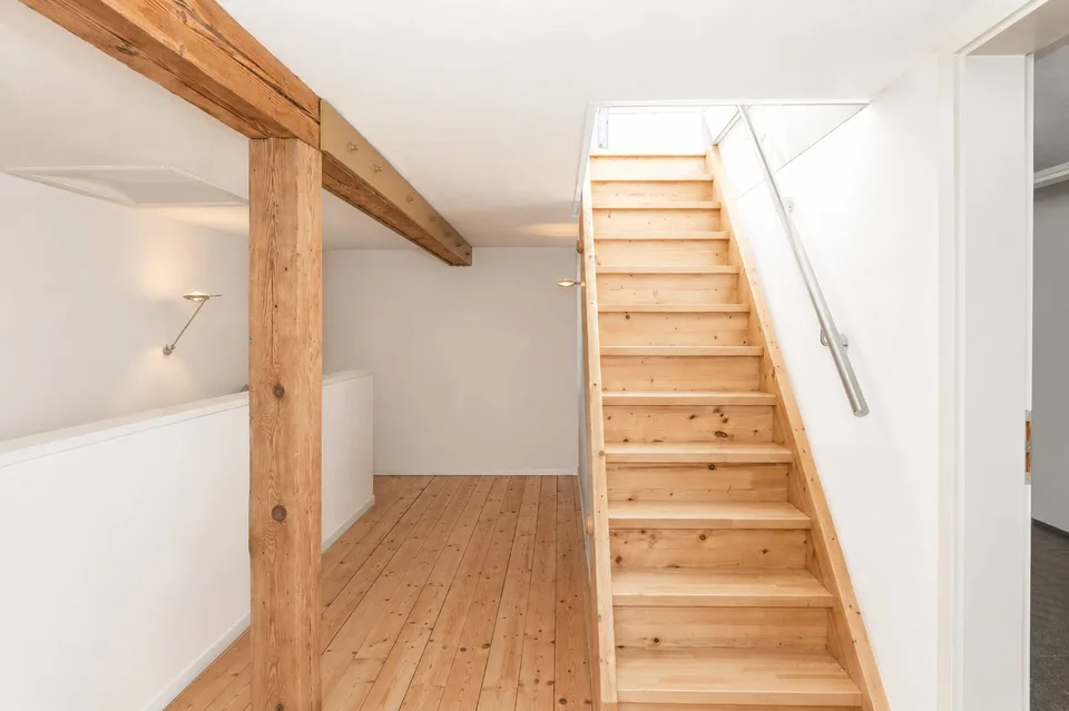 Attractive 3.5-room attic apartment with private rooftop terrace and panoramic view of Zurich and Lake Zurich