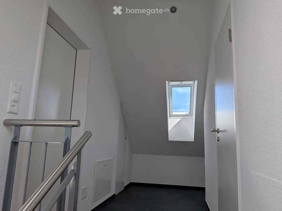 4.5-room semi-detached house in Hinteregg – Nature, garden, and city proximity combined