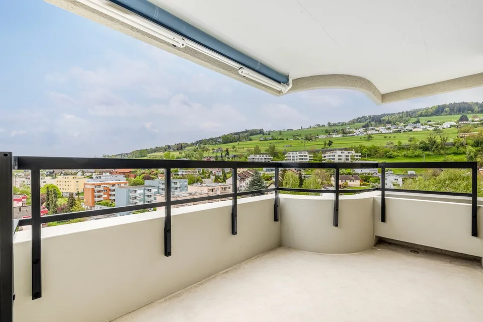 Move in and enjoy - Living where others vacation with unique lake view and balcony