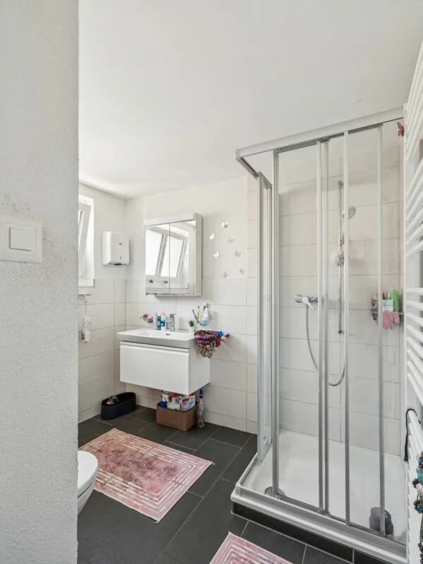 Maison à appartements avec locaux commerciaux, garages - Investissement locatif polyvalent avec potentiel de développement. Copie – photo 19 sur 30