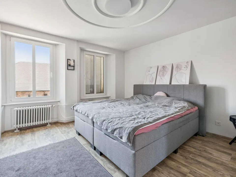 Maison à appartements avec locaux commerciaux, garages - Investissement locatif polyvalent avec potentiel de développement. Copie – photo 17 sur 30