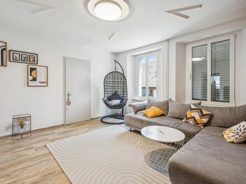 Maison à appartements avec locaux commerciaux, garages - Investissement locatif polyvalent avec potentiel de développement. Copie – photo 18 sur 30