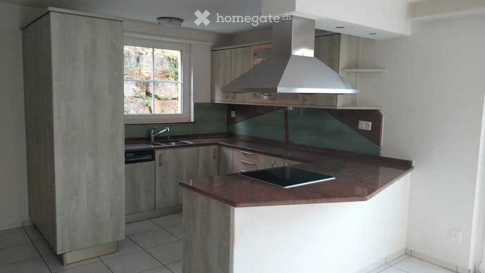 Maison mitoyenne de 4,5 pièces confortable avec petit jardin