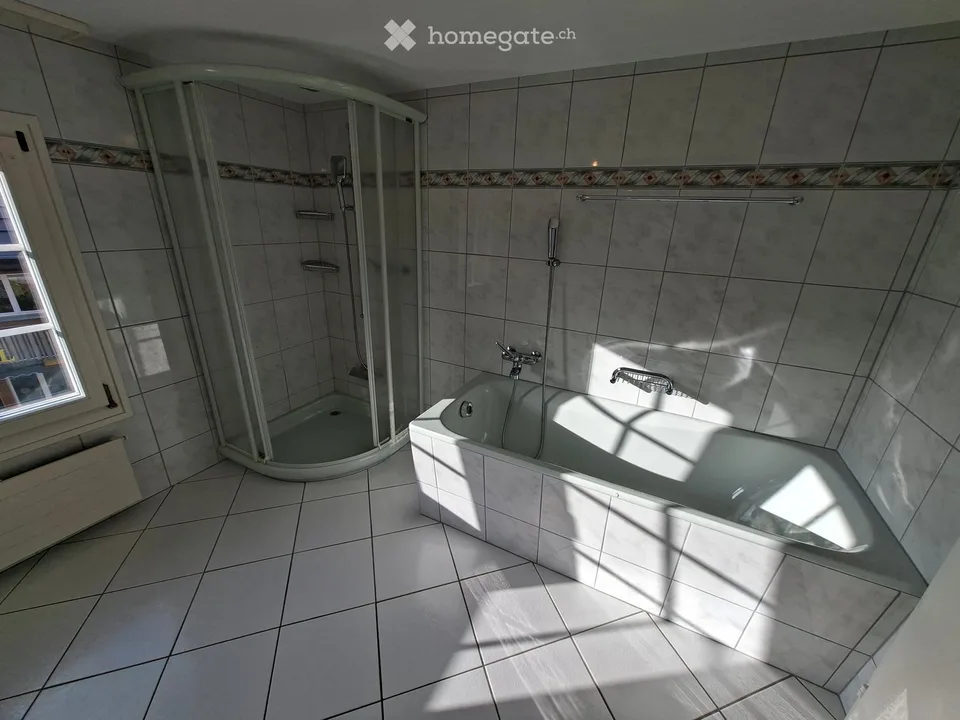 Bright 3.5-room apartment with balcony at Kirchplatz in Bütschwil