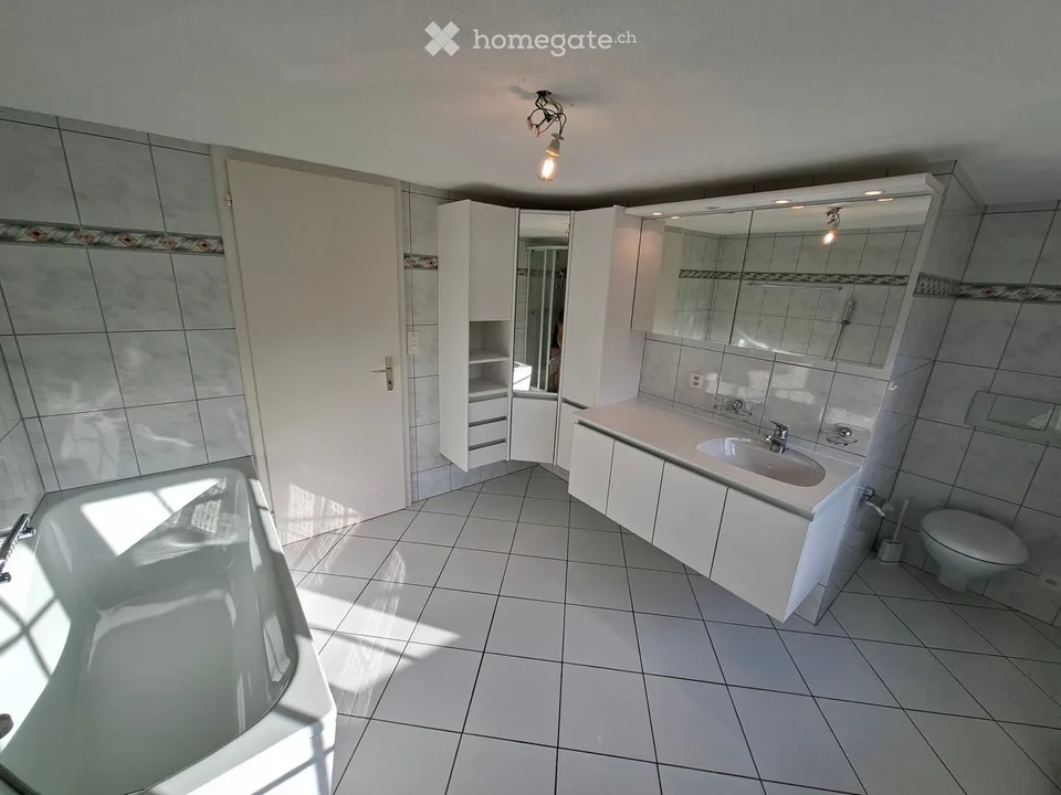 Bright 3.5-room apartment with balcony at Kirchplatz in Bütschwil