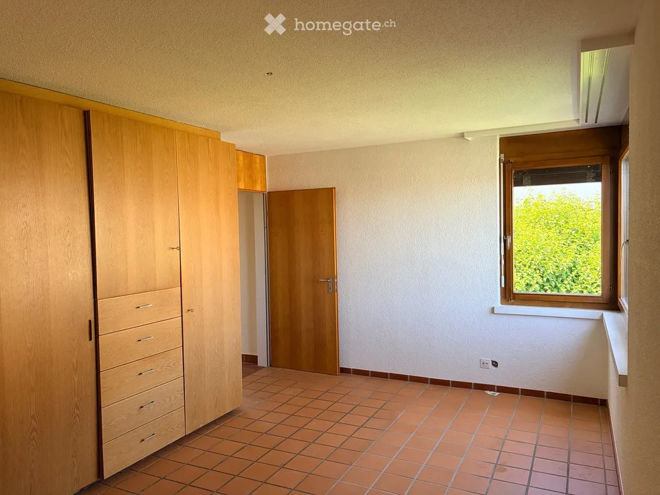 Corner house (semi-detached house) with large garden in Dielsdorf