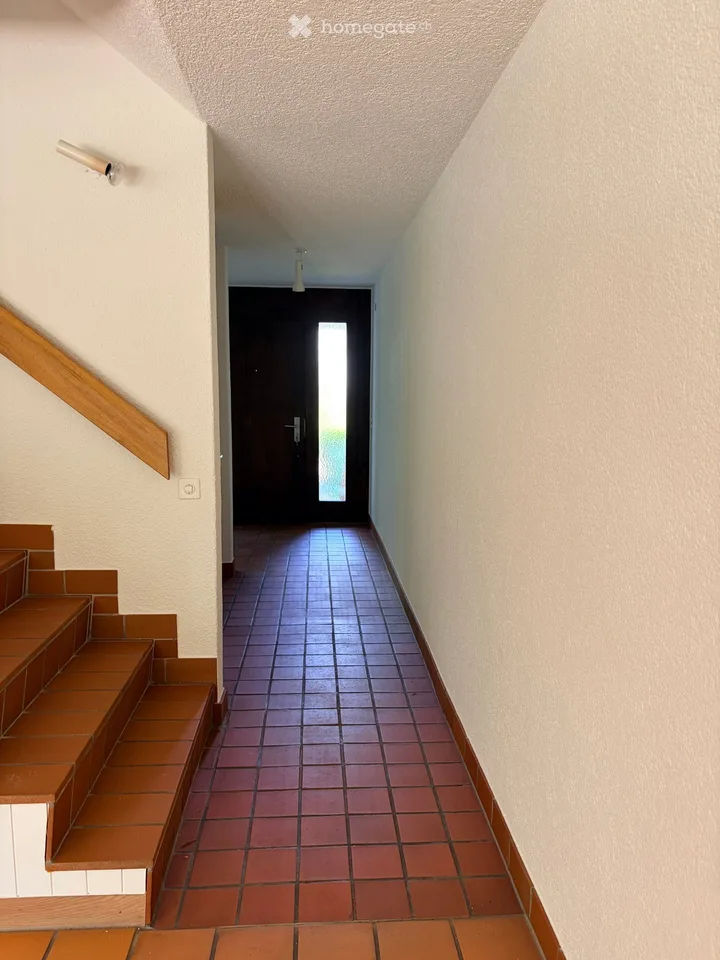 Corner house (semi-detached house) with large garden in Dielsdorf
