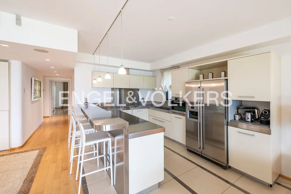 Esclusivo appartamento con giardino e vista lago – foto 5 di 13