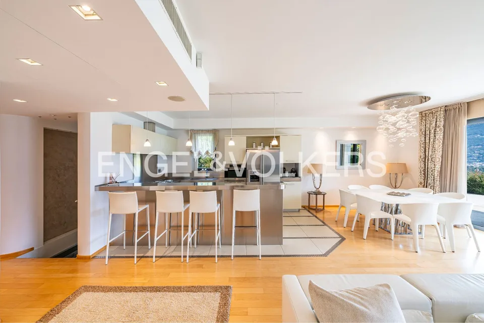 Esclusivo appartamento con giardino e vista lago – foto 4 di 13